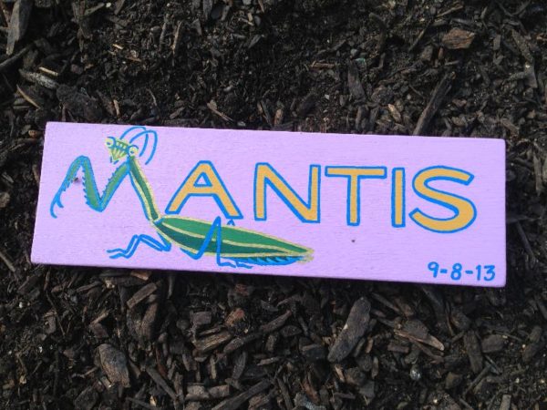 Wooden sign created by Chris Thompson